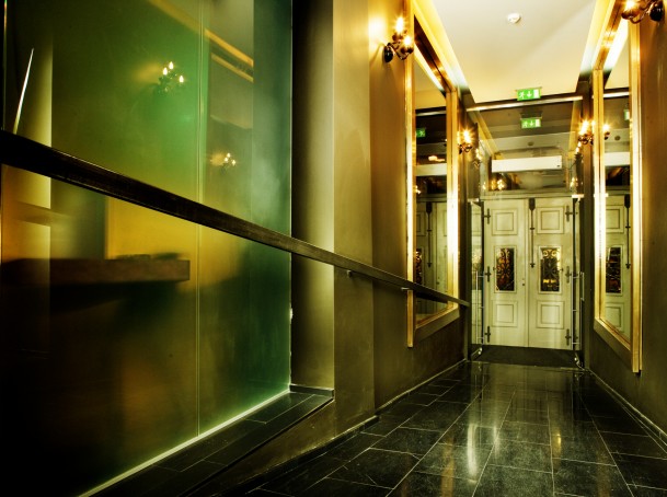 Two sets of door - entrance to the hotel icon - photo copyright @ Icon